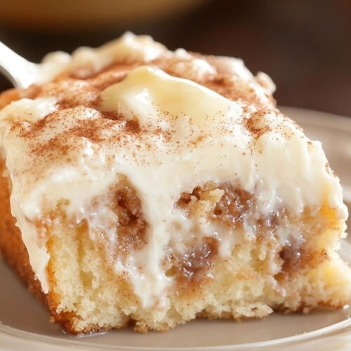Cinnamon Roll Poke Cake