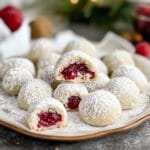 Raspberry Filled Almond Snowball Cookies